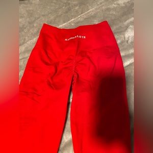 Alphalete leggings. bright red